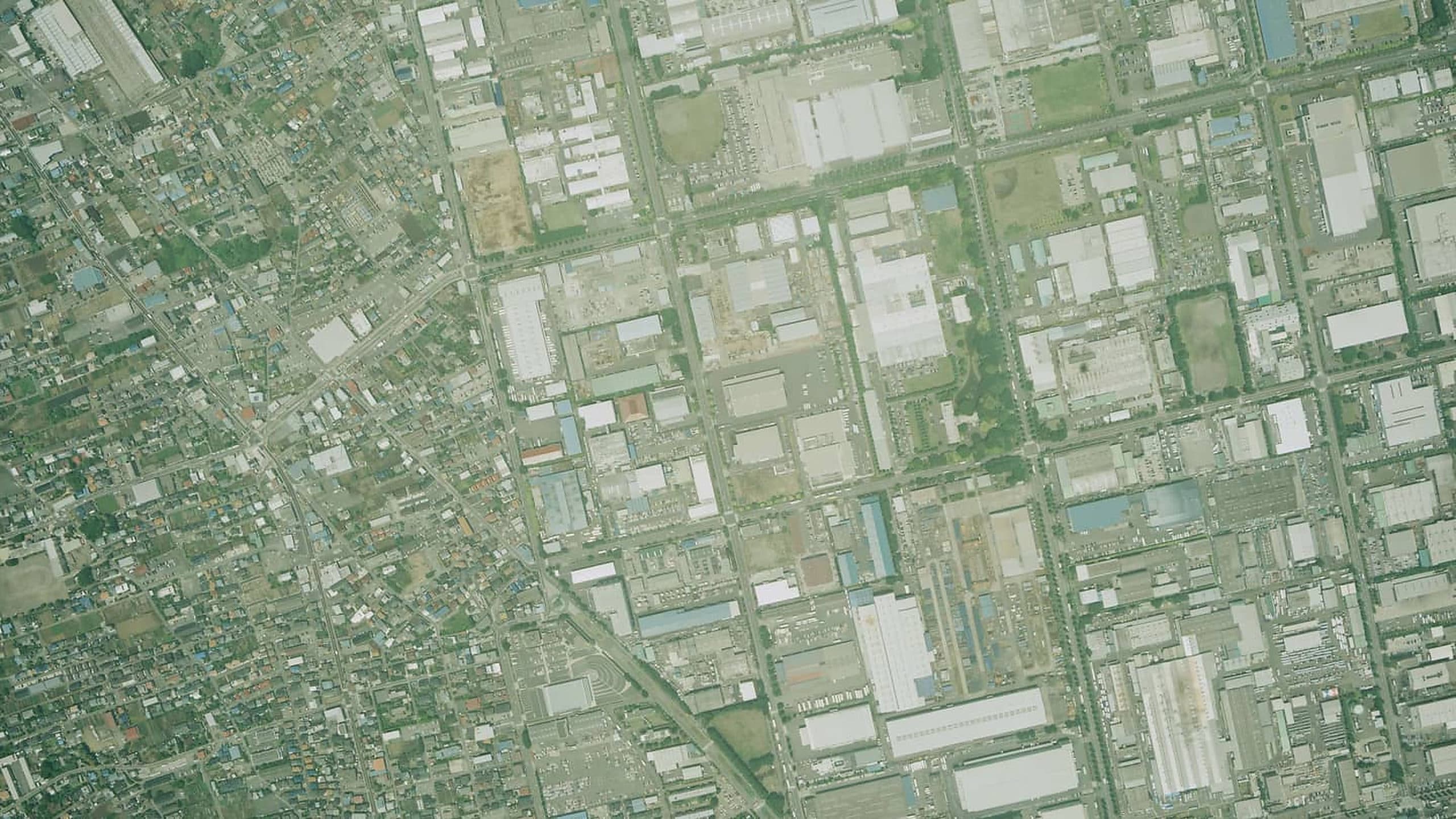 Vertical aerial view of an industrial park laid out on a road grid.